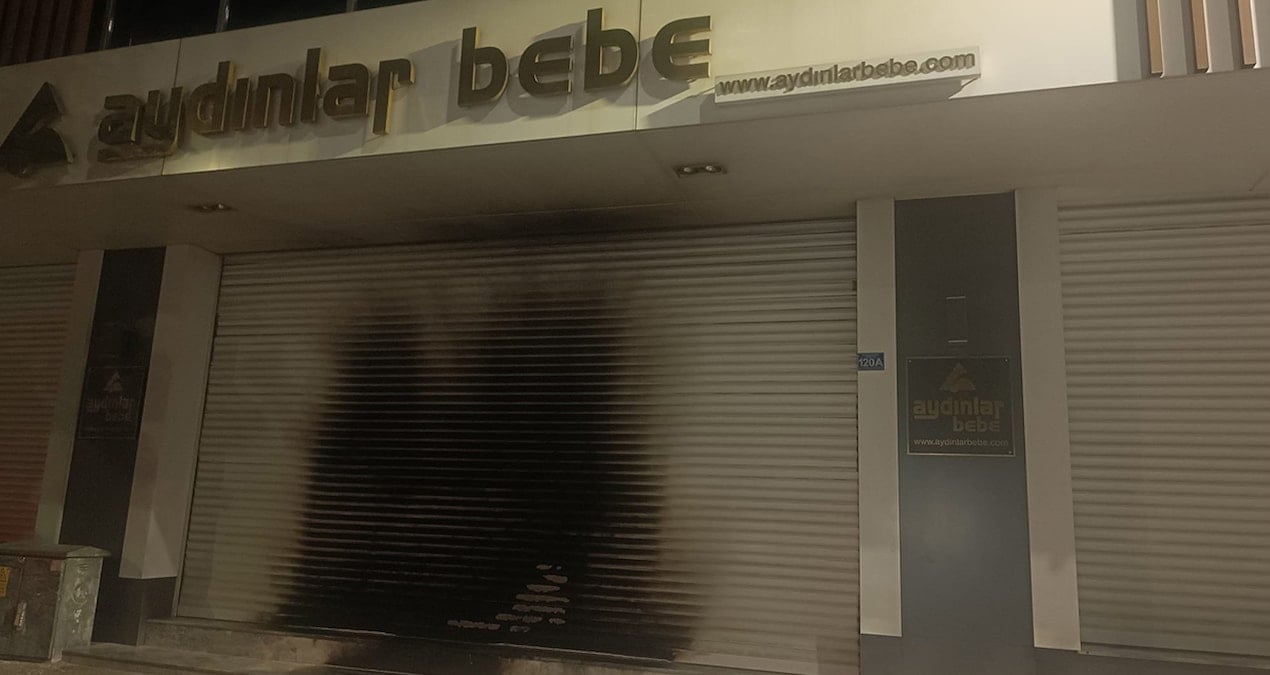 yer bursa magazayi kundaklamaya calisti o anlari cep telefonu kamerasiyla kaydetti 6OAZsxpO